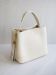 Bilde av ELISABETH SKINNVESKE, BEIGE